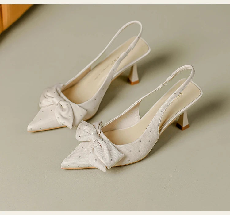 Sweet rhinestone bow hollow high heels women's stiletto heel French kick-off not tired foot temperament baotou sandals summer