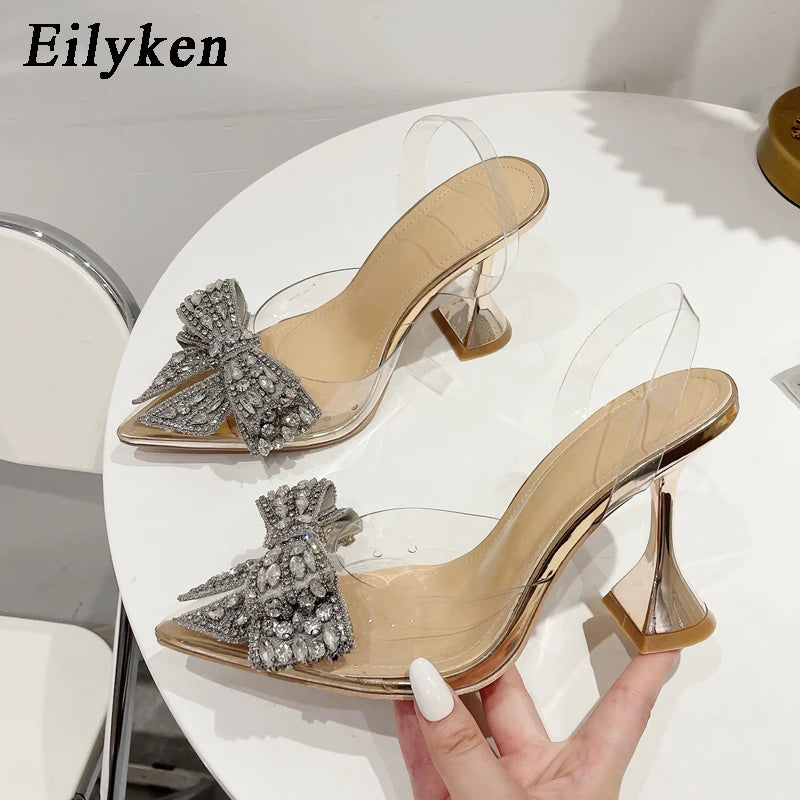 Eilyken Fashion Crystal Sequined Bowknot Women Pumps Sexy Pointed Toe High Heels PVC Transparent Sandals Wedding Prom Shoes