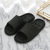 Quick-drying cheap women's slippers Non-slip soft-sole bathroom slippers hollowed out leaky slippers Casual couple home slippers