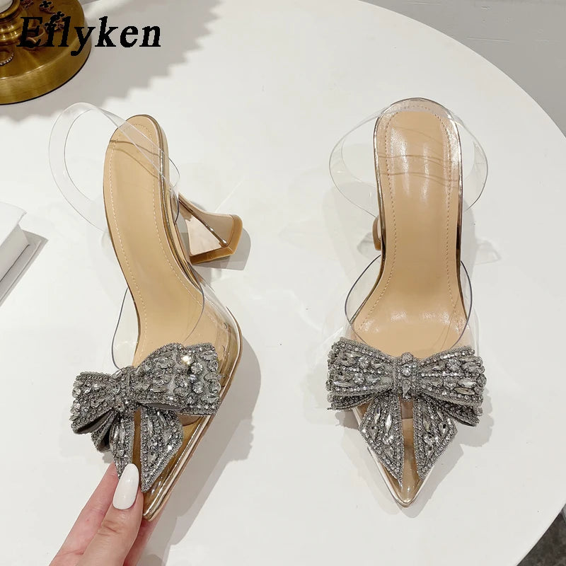 Eilyken Fashion Crystal Sequined Bowknot Women Pumps Sexy Pointed Toe High Heels PVC Transparent Sandals Wedding Prom Shoes