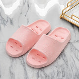 Quick-drying cheap women's slippers Non-slip soft-sole bathroom slippers hollowed out leaky slippers Casual couple home slippers