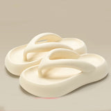 Tongs à semelle épaisse pour femmes été 2024 nouvelles sandales de plage antidérapantes augmentant la hauteur pantoufles de plage pour vêtements d'extérieur