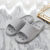 Quick-drying cheap women's slippers Non-slip soft-sole bathroom slippers hollowed out leaky slippers Casual couple home slippers