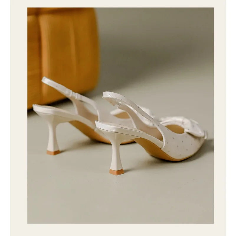 Sweet rhinestone bow hollow high heels women's stiletto heel French kick-off not tired foot temperament baotou sandals summer